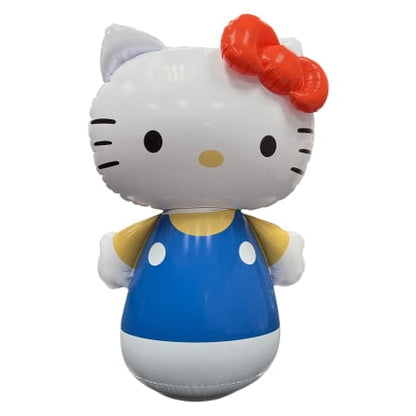 Fully inflated Hello Kitty character toy with red bow, yellow nose, and blue dress