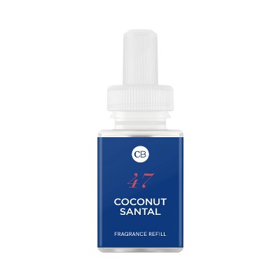 Close-up of Pura Coconut Santal fragrance refill bottle with blue label