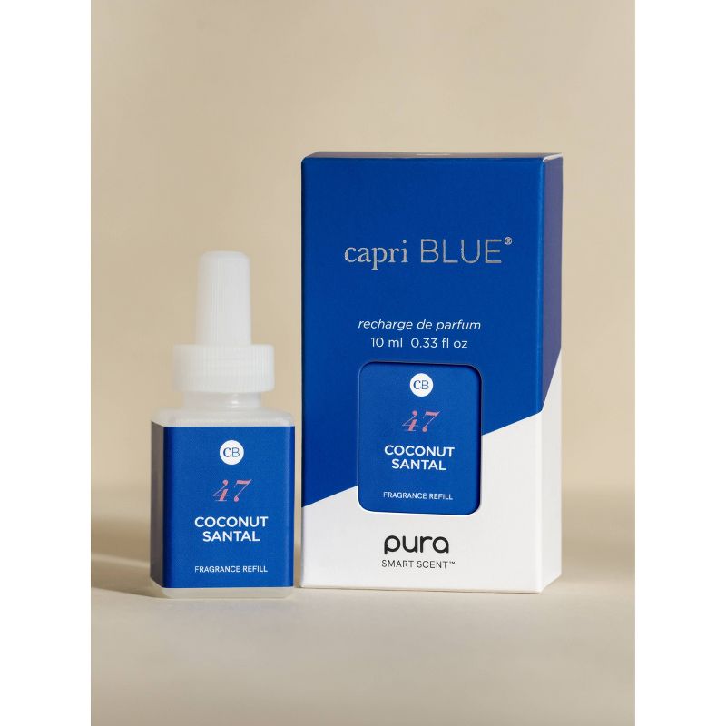 Pura Coconut Santal fragrance refill bottle alongside its blue and white packaging box