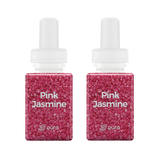 Two Pura Pink Jasmine fragrance refill vials with textured pink particles and white caps