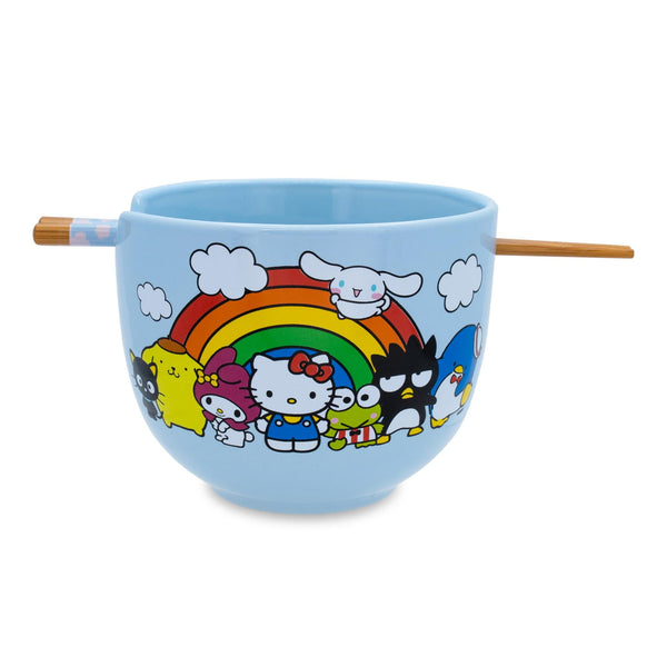 Light blue ceramic ramen bowl featuring Hello Kitty and friends under a rainbow with bamboo chopsticks resting in bowl notch