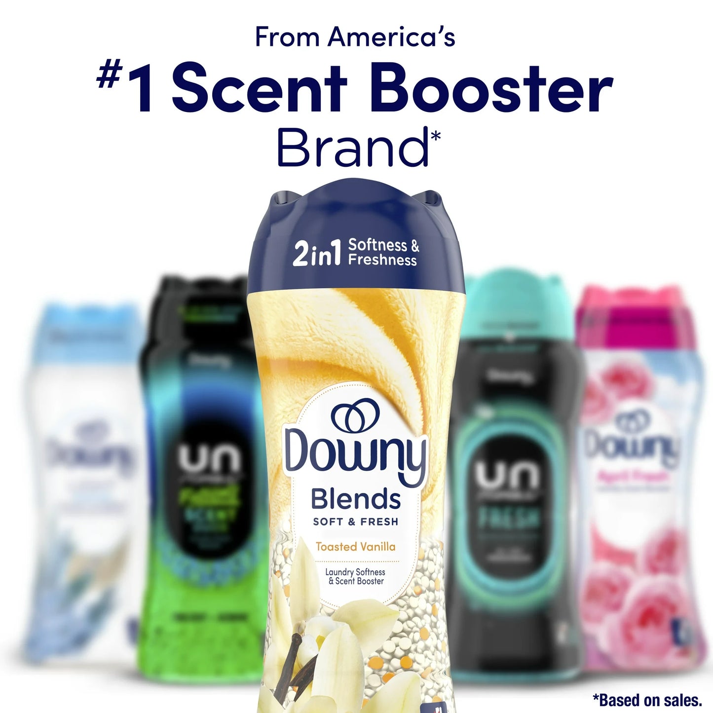 Washing machine door open with Downy Blends Soft & Fresh bottle nearby  