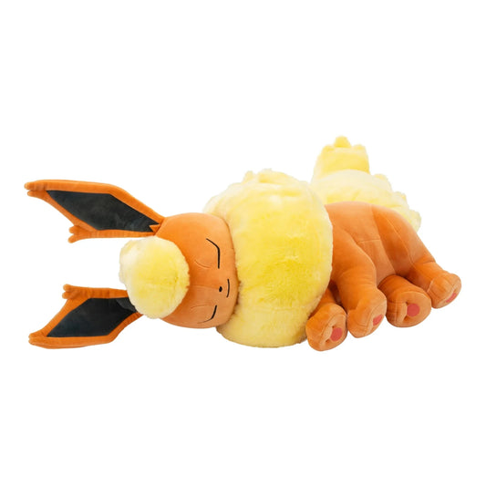 Side view of 18-inch Flareon plush depicting detailed fur texture and curled sleeping pose  